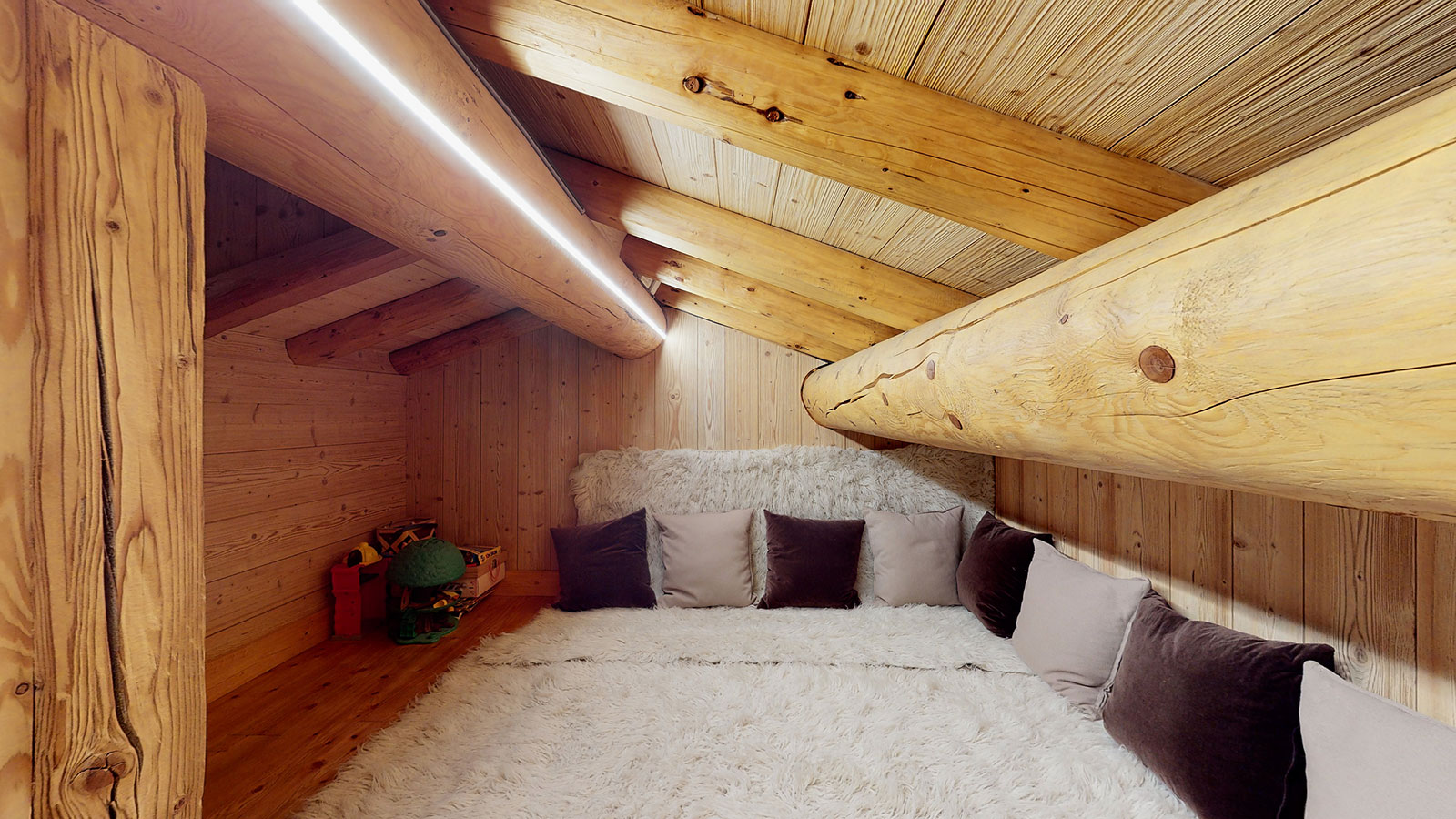 Salle de jeux du Chalet La Marsa, espace convivial pour enfants et adultes